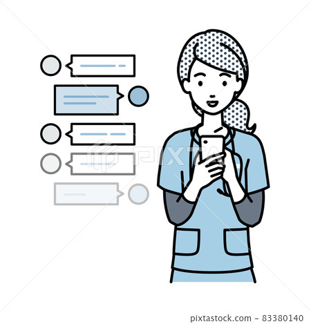 A nurse woman who stands up and has a fun chat conversation on her smartphone A nurse woman who stands up and has a fun chat conversation on her smartphone 83380140
