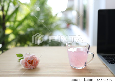 Lychee Juice and pink rose flower on wooden table Lychee Juice and pink rose flower on wooden table 83380389