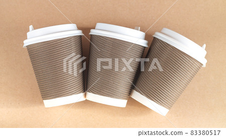 Craft biodegradable brown paper cups top view Craft biodegradable brown paper cups top view 83380517
