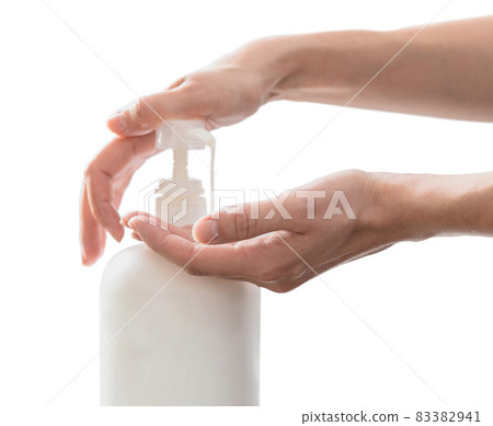 Woman hands pushing pump plastic soap bottle, isolated on white background with copy space Woman hands pushing pump plastic soap bottle, isolated on white background with copy space 83382941
