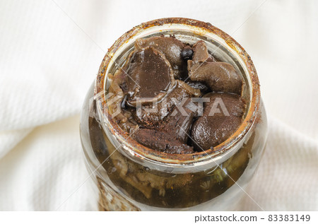 Botulism, food poisoning from canned foods concept. Opened Glass Botulism, food poisoning from canned foods concept. Opened Glass 83383149