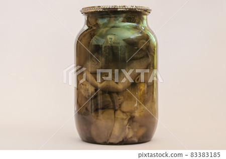 Botulism, food poisoning from canned foods concept. Glass jar wi Botulism, food poisoning from canned foods concept. Glass jar wi 83383185