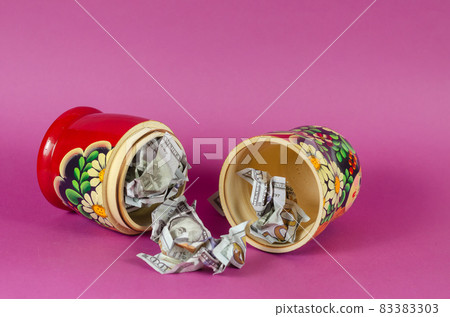 Russian matryoshka full of money. 83383303