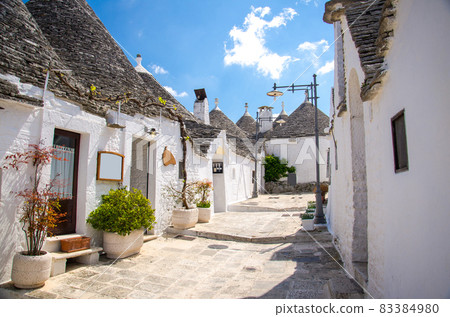 Town of Alberobello, village with Trulli houses in Puglia Apulia region Town of Alberobello, village with Trulli houses in Puglia Apulia region 83384980