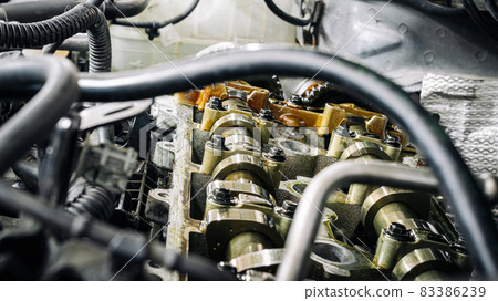 Car service auto. Automotive repair in garage workshop. Mechanic engine vehicle diagnostic. Technician maintenance. Car service auto. Automotive repair in garage workshop. Mechanic engine vehicle diagnostic. Technician maintenance. 83386239