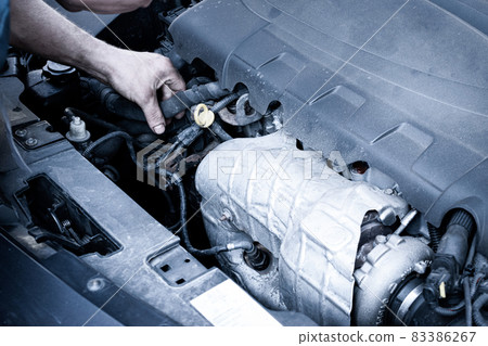 Car service auto. Automotive repair in garage workshop. Mechanic engine vehicle diagnostic. Technician maintenance. Car service auto. Automotive repair in garage workshop. Mechanic engine vehicle diagnostic. Technician maintenance. 83386267