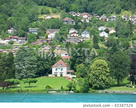 A cute house on the shores of Lake Annecy in Europe, Annecy, Haute-Savoie, France 83387329