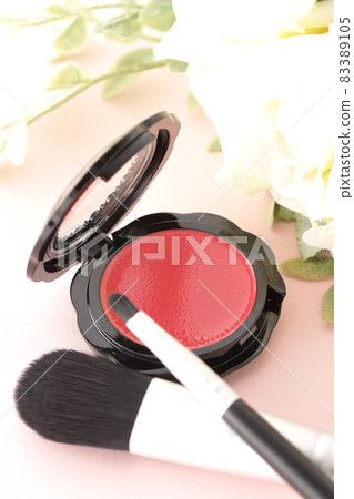 Cream blush, brush and flowers Cream blush, brush and flowers 83389105