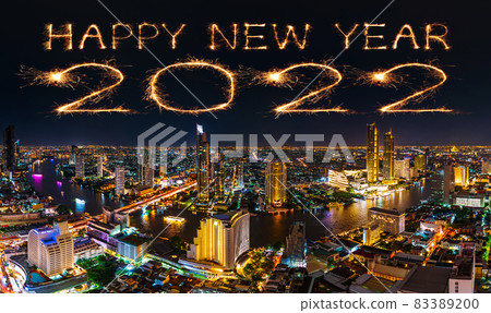 2022 happy new year fireworks over Chao Phraya river in Bangkok city at night, Thailand 83389200