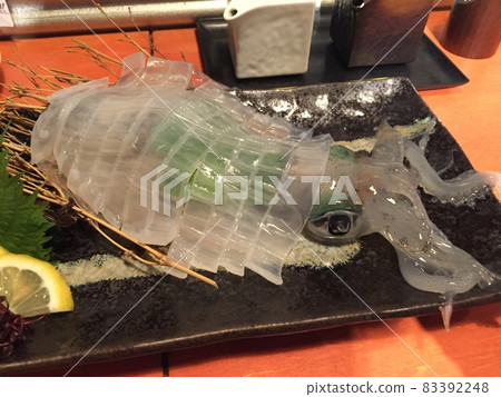 Making squid, a specialty of Yobuko Making squid, a specialty of Yobuko 83392248