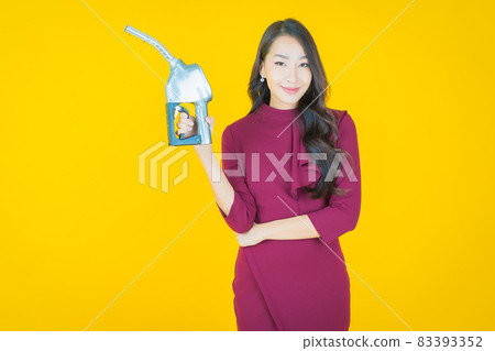 Portrait beautiful young asian woman feul gas pump 83393352