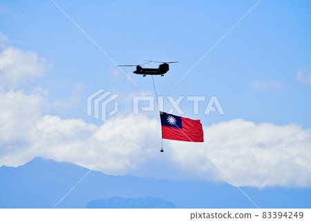 Military helicopter flying the Taiwanese flag on Taiwan National Day Military helicopter flying the Taiwanese flag on Taiwan National Day 83394249