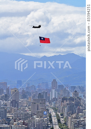 Military helicopter flying the Taiwanese flag on Taiwan National Day Military helicopter flying the Taiwanese flag on Taiwan National Day 83394251