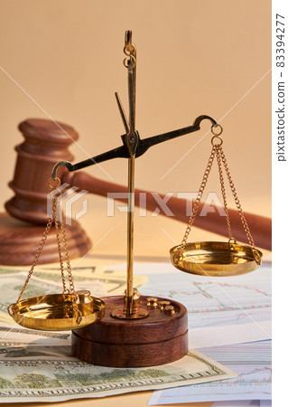 Close-up scales and wooden judge gavel hammer. Close-up scales and wooden judge gavel hammer. 83394277