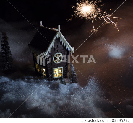 chocolate house on a snow, decoration in a Christmas chocolate house on a snow, decoration in a Christmas 83395232