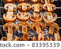 Barbecue skewers with grilled champignon mushroom kebab in a brazier 83395339