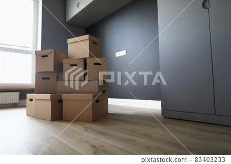 Empty room with packed stuff 83403233