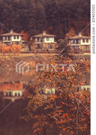 Autumn landscape with lake and houses, Bulgaria Autumn landscape with lake and houses, Bulgaria 83403505