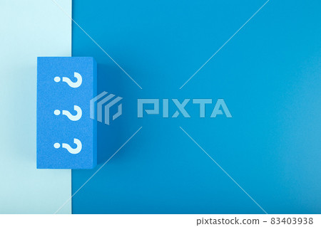 Three question marks on blue rectangle on monochromatic blue background with copy space Three question marks on blue rectangle on monochromatic blue background with copy space 83403938