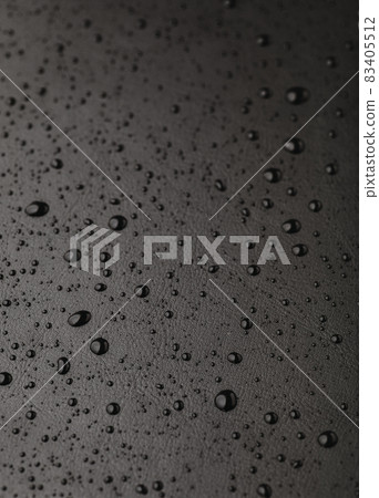 Water drops on leather background. Black 83405512