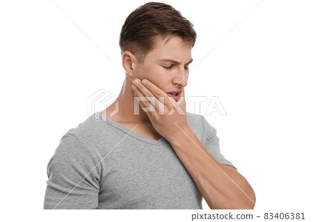 Frustrated sad young european male suffering from toothache, feeling unwell 83406381