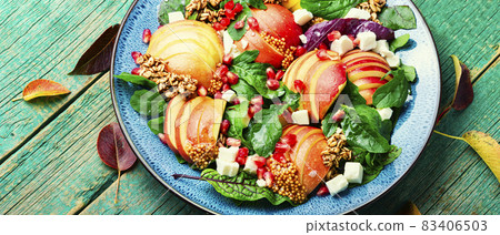 Homemade salad with apple,herbs and oatmeal 83406503
