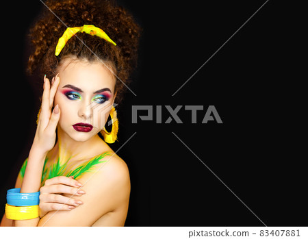 Beauty woman face on black background. Beautiful model girl makeup Beauty woman face on black background. Beautiful model girl makeup 83407881