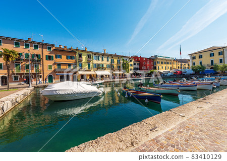 Old Port in Lazise village - Tourist resort on Lake Garda Veneto Italy 83410129