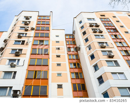 facade orange and white high-rise apartment house facade orange and white high-rise apartment house 83410265