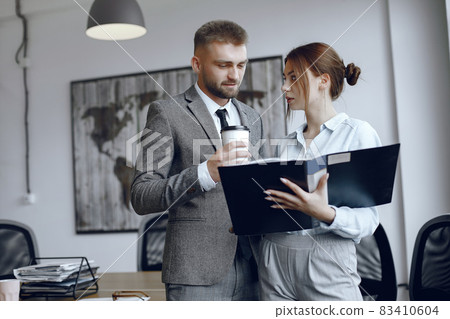 Man and woman read a business contract 83410604
