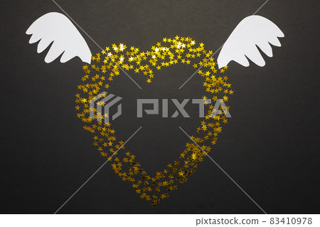 Merry festive picture with a gold heart with ears. Romantic layout composition. Greeting card. Mockup 83410978