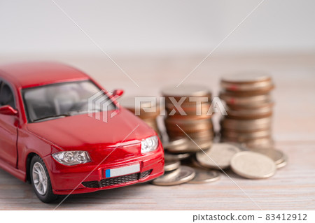 Car on coins background; Car loan, Finance, saving money, insurance and leasing time concepts. 83412912