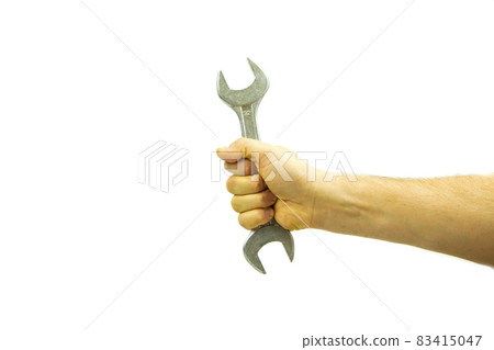 Repairing work spanner wrench tool in human hand 83415047