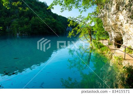 Lake with clear turquoise water, National park Plitvice Lakes, Croatia Lake with clear turquoise water, National park Plitvice Lakes, Croatia 83415571