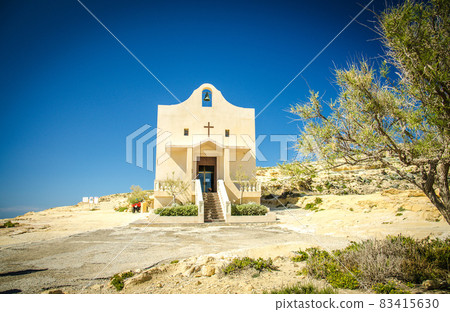 Small catholic church near Azure Window, Gozo Island, Malta 83415630
