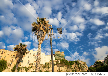 Tropea town colorful stone buildings on top of cliff, Calabria, Italy 83415637