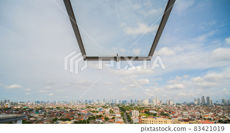 Jakarta city panorama against the background of the window pane. 83421019