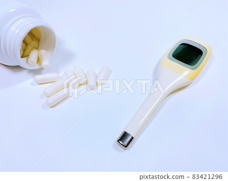 Medical image medicine and thermometer white background 83421296