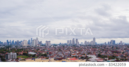 Panorama of the city of Jakarta, the capital of Indonesia, in cloudy weather. Panorama of the city of Jakarta, the capital of Indonesia, in cloudy weather. 83422059