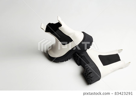 fashion female shoes still life. stylish chelsea boots 83423291