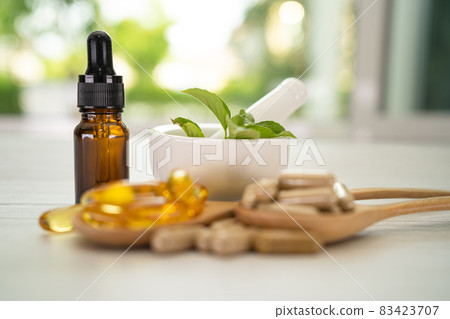 Alternative medicine herbal organic capsule with vitamin E omega 3 fish oil, mineral, drug with herbs leaf natural supplements for healthy good life. Alternative medicine herbal organic capsule with vitamin E omega 3 fish oil, mineral, drug with herbs leaf natural supplements for healthy good life. 83423707