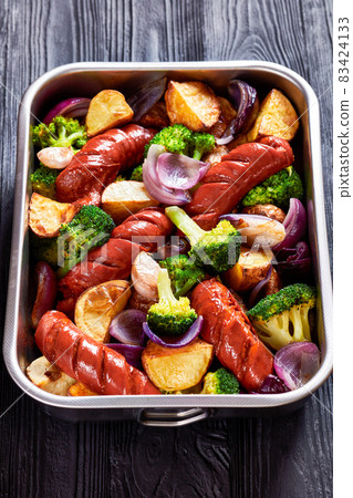Sausage and vegetable traybake, top view, close-up Sausage and vegetable traybake, top view, close-up 83424133