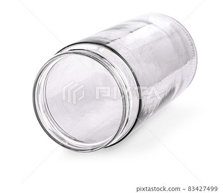 glass empty jar on the side isolated on white background glass empty jar on the side isolated on white background 83427499