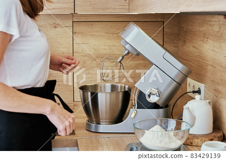 Woman cooking homemade cake 83429139