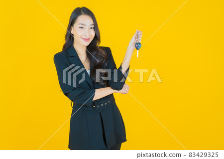 Portrait beautiful young asian woman smile with car key Portrait beautiful young asian woman smile with car key 83429325