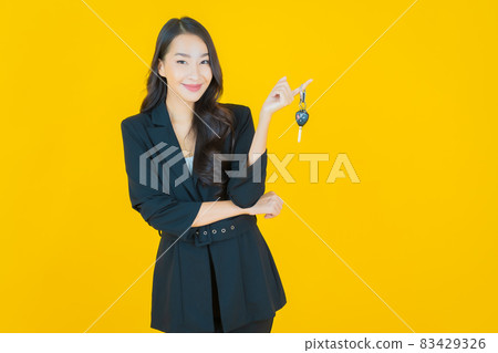 Portrait beautiful young asian woman smile with car key Portrait beautiful young asian woman smile with car key 83429326