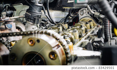 Car service auto. Automotive repair in garage workshop. Mechanic engine vehicle diagnostic. Technician maintenance. 83429501