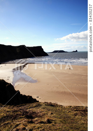 Worm's Head as seen from Rhossili Bay on the Gower Peninsular West Glamorgan Wales UK 83430257