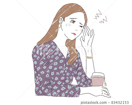 A woman suffering from a headache A woman suffering from a headache 83432153