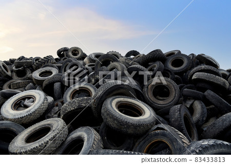Landfill with old tires and tyres for recycling.  83433813